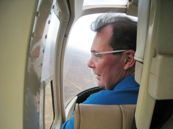 John Wordsworth flying over Victoria Falls in Helicopter