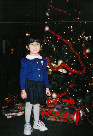 Jess in front of Christmas Tree