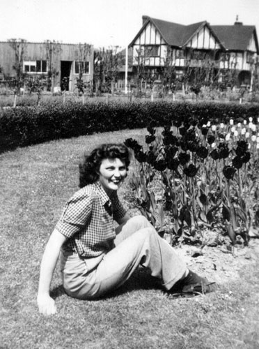 Joyce Wordsworth in a garden in 1940